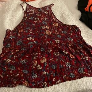Mauve burgundy red Peplum tank with button detail on back
